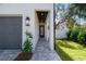 Side entrance with paved walkway leading to the front door at 2318 Bay St, Sarasota, FL 34237