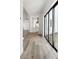 Bright living room with hardwood floors and view to backyard at 2318 Bay St, Sarasota, FL 34237