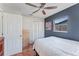Well-lit bedroom with double closets and terracotta floors at 1841 Buccaneer Dr, Sarasota, FL 34231