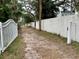 Gated entry leading to waterfront property at 1841 Buccaneer Dr, Sarasota, FL 34231