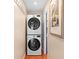 Convenient laundry room with stacked LG washer and dryer at 1841 Buccaneer Dr, Sarasota, FL 34231