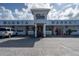 Exterior of Siesta Market on a cloudy day with parking lot and storefront details at 1841 Buccaneer Dr, Sarasota, FL 34231