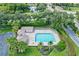 Community pool and recreation area viewed from above at 7341 Featherstone Blvd, Sarasota, FL 34238
