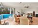 Relaxing game room with seating area, and large windows at 7341 Featherstone Blvd, Sarasota, FL 34238