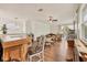 Game room with wet bar, seating area, and large windows at 7341 Featherstone Blvd, Sarasota, FL 34238