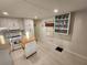 Bright kitchen features white cabinets, wood countertops, and modern appliances at 808 53Rd E Ave # 8, Bradenton, FL 34203