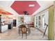 Spacious dining area with water views and access to patio at 8213 Midnight Pass Rd, Sarasota, FL 34242