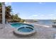 Stunning pool and spa overlooking the water at 8213 Midnight Pass Rd, Sarasota, FL 34242