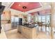 Spacious kitchen boasting stainless steel appliances and water views at 8213 Midnight Pass Rd, Sarasota, FL 34242