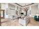 Spacious living room featuring sofas and a large TV at 8213 Midnight Pass Rd, Sarasota, FL 34242