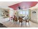 Waterfront dining area featuring a large table and scenic views at 8213 Midnight Pass Rd, Sarasota, FL 34242