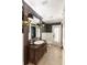 Charming bathroom with antique vanity and patterned wallpaper at 8213 Midnight Pass Rd, Sarasota, FL 34242
