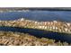 Aerial view of waterfront homes and community at 8213 Midnight Pass Rd, Sarasota, FL 34242