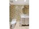 Powder room featuring a white vanity and bird wallpaper at 8213 Midnight Pass Rd, Sarasota, FL 34242