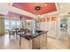 Modern kitchen with stainless steel appliances and water views at 8213 Midnight Pass Rd, Sarasota, FL 34242