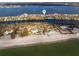 Aerial view of beachfront property with private beach access at 8213 Midnight Pass Rd, Sarasota, FL 34242