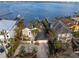 Waterfront home with private dock and lush landscaping at 8213 Midnight Pass Rd, Sarasota, FL 34242