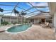 Relaxing screened pool and patio area at 1210 Eagles Flight Way, North Port, FL 34287
