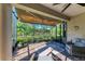 Spacious screened porch overlooks lush landscaping at 5016 Savona Run, Bradenton, FL 34211