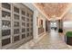 Community wine storage with individual lockers and elegant design at 5016 Savona Run, Bradenton, FL 34211