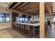 L-shaped bar with comfortable seating and large windows at 5016 Savona Run, Bradenton, FL 34211