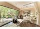 Relaxing spa room featuring a comfortable couch and garden view at 5016 Savona Run, Bradenton, FL 34211