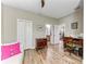 Spacious office with hardwood floors, and access to a full bathroom at 5016 Savona Run, Bradenton, FL 34211