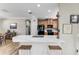 Modern kitchen with stainless steel appliances and quartz countertops at 5016 Savona Run, Bradenton, FL 34211