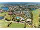 Aerial view of community amenities including golf, pool, and tennis at 5016 Savona Run, Bradenton, FL 34211