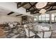 Elegant dining area with modern tables, chairs and large windows at 5016 Savona Run, Bradenton, FL 34211