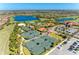 Community tennis courts near clubhouse and pool at 5016 Savona Run, Bradenton, FL 34211