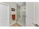 Clean bathroom with a walk-in shower and neutral color scheme at 5016 Savona Run, Bradenton, FL 34211