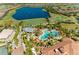 Resort-style pool with lounge chairs and landscaping at 5016 Savona Run, Bradenton, FL 34211