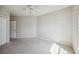 Spacious bedroom with carpeted floor and ceiling fan at 5122 Northridge Rd # 207, Sarasota, FL 34238