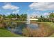 Serene pond with fountain in community at 5122 Northridge Rd # 207, Sarasota, FL 34238