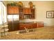 Community kitchenette with granite counters and stainless steel appliances at 5122 Northridge Rd # 207, Sarasota, FL 34238