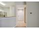 Clean entryway with tile floors and access to kitchen and hallway at 5122 Northridge Rd # 207, Sarasota, FL 34238