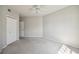 Bedroom with ceiling fan, neutral walls, and carpet flooring at 5122 Northridge Rd # 207, Sarasota, FL 34238