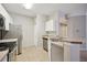 Kitchen with stainless steel appliances and double sink at 5122 Northridge Rd # 207, Sarasota, FL 34238