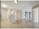 Open kitchen with stainless steel appliances and white cabinets at 5122 Northridge Rd # 207, Sarasota, FL 34238