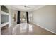 Spacious living room featuring tile floors and access to a private balcony at 5122 Northridge Rd # 207, Sarasota, FL 34238