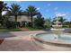 Community entrance with fountain and landscaping at 5122 Northridge Rd # 207, Sarasota, FL 34238