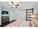 Comfortable bedroom with king-size bed and barn door at 2425 Clematis St, Sarasota, FL 34239