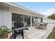 Outdoor patio with seating area and built-in grill, perfect for entertaining at 2425 Clematis St, Sarasota, FL 34239