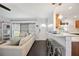 Open concept kitchen with breakfast bar and view of living room at 2425 Clematis St, Sarasota, FL 34239