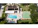 Aerial view of community pool, shuffleboard courts, and clubhouse at 2911 74Th W St # 2276, Bradenton, FL 34209