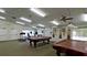 Clubhouse recreation area with pool tables and exercise equipment at 2911 74Th W St # 2276, Bradenton, FL 34209