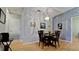 Dining room with round table, four chairs and hardwood floors at 2911 74Th W St # 2276, Bradenton, FL 34209