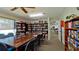 Clubhouse library with a large table and extensive book collection at 2911 74Th W St # 2276, Bradenton, FL 34209