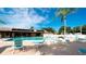 Relax by the pool with lounge chairs and tables at 2911 74Th W St # 2276, Bradenton, FL 34209